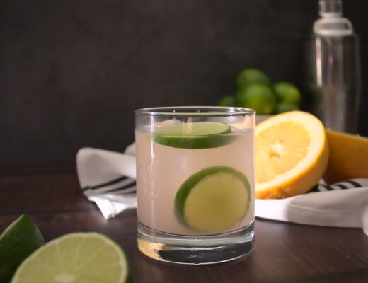 Photo of mixed skinny paloma served in a rocks glass with lime slices