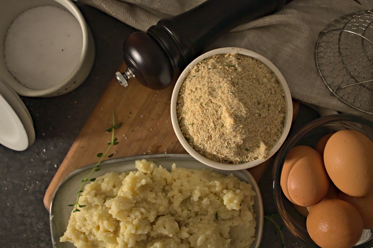 Overhead photo of leftover risotto, eggs, and breadcrumbs