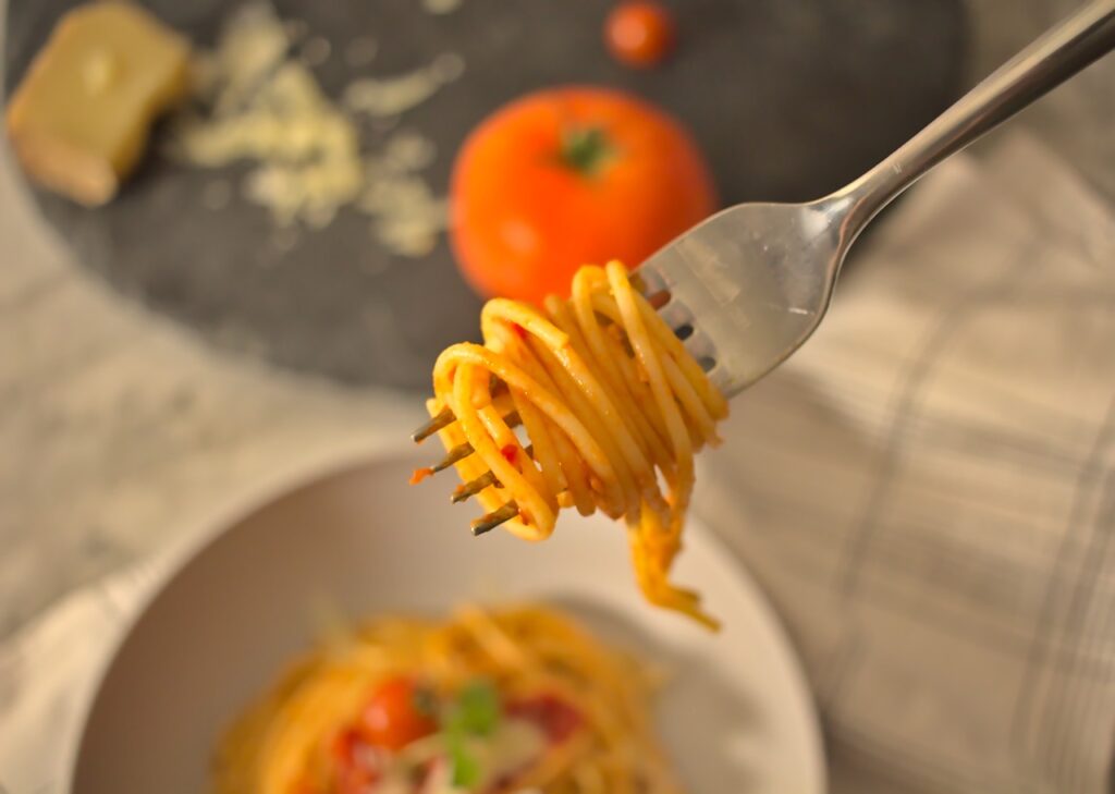 Closeup photo of pasta twirled on a fork