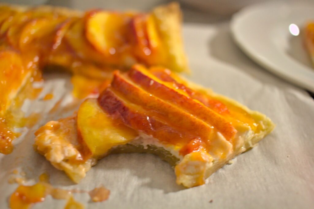 Closeup photo of nectarine tart slice