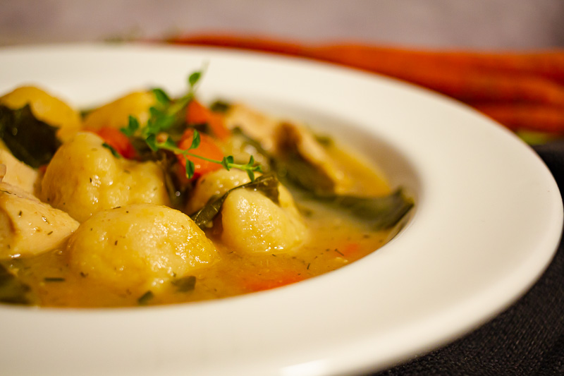 Closeup photo of chicken and cornbread dumplings