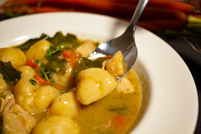 Closeup photo of chicken and cornbread dumplings