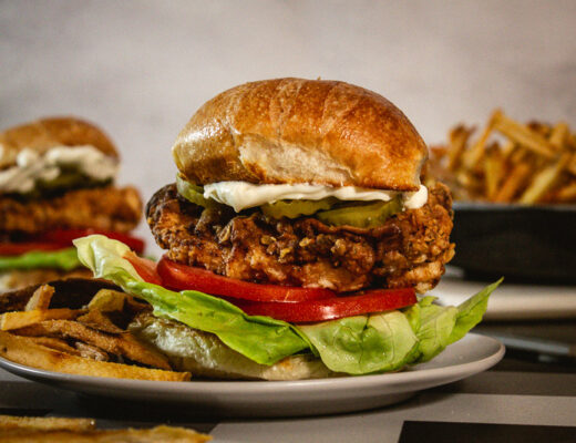 Photo of fried chicken sandwich with french fries